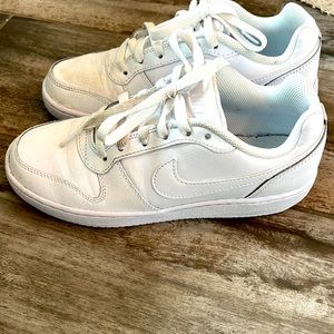 All white Nike shoes